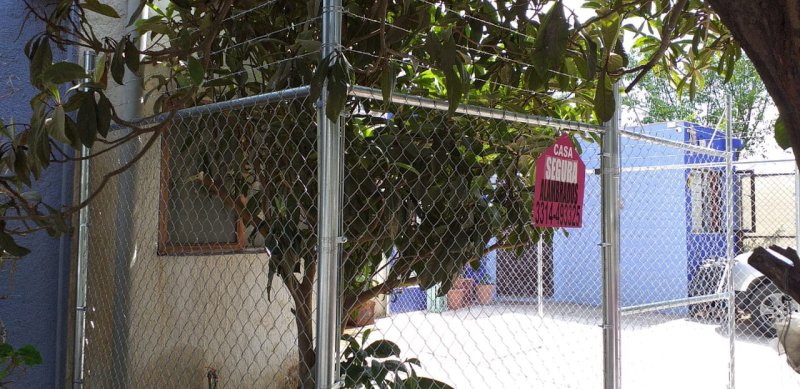 Malla Ciclónica con Puerta de Colonia Bosques de San Gonzalo